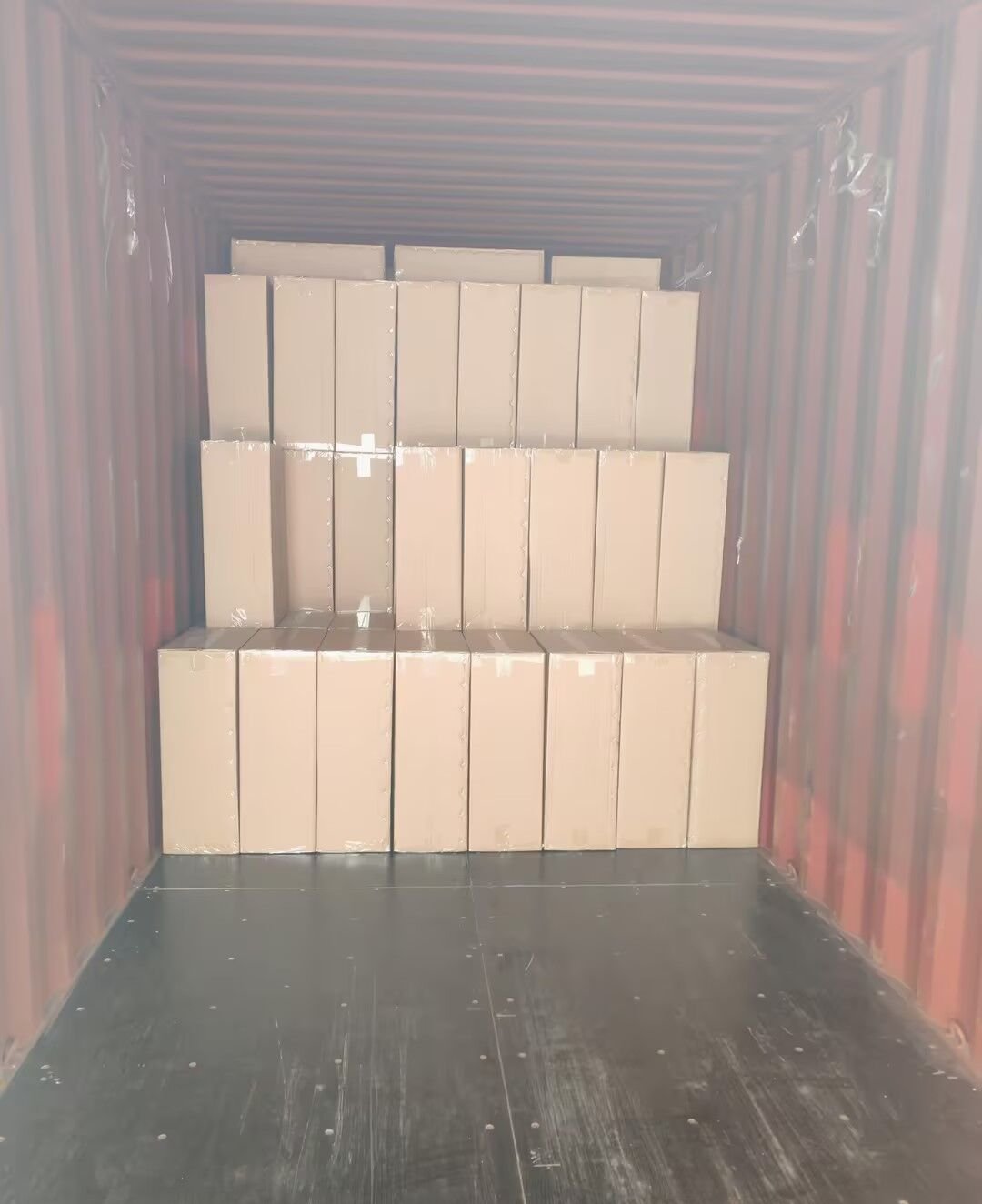 Cartons of silicone molds stacked and secured inside a 20GP container at Shanghai, September 2026